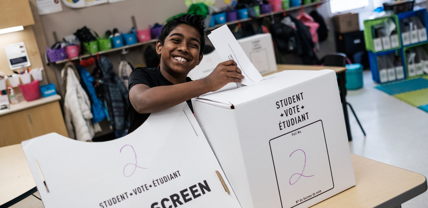 Students submitting their ballots