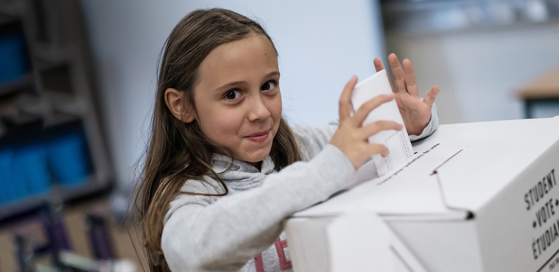 Students submitting their ballots
